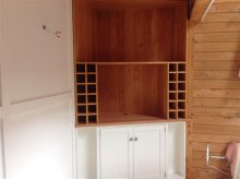 TV unit with wine racks, DVD rack and cupboards TV unit with wine racks, DVD rack and cupboards