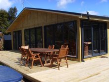 this house was moved, recladed, and refurbished inside.