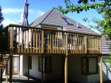 new deck and cedar bi-fold doors