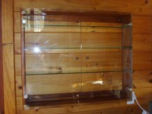rimu wall unit with glass doors. rimu wall unit with glass doors.